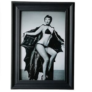 Retro bat girl in Halloween bat costume antique